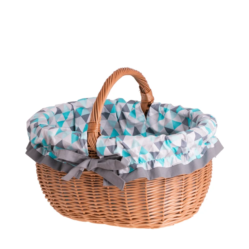 Werburga shopping basket with a wicker handle and blue trim TheWickerStories