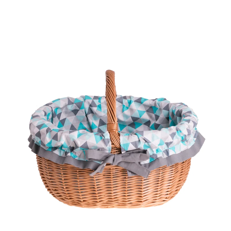 Werburga shopping basket with a wicker handle and blue trim TheWickerStories