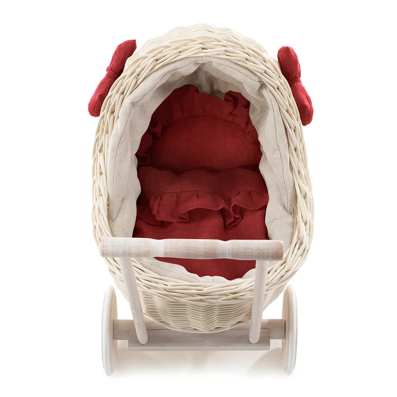 Desayer wicker doll stroller with linen trim and red bedding, featuring a handle, quilt, and pillow TheWickerStories