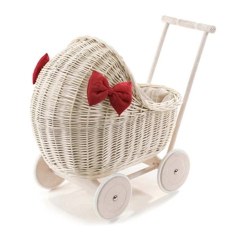 Desayer wicker doll stroller with linen trim and red bedding, featuring a handle, quilt, and pillow TheWickerStories