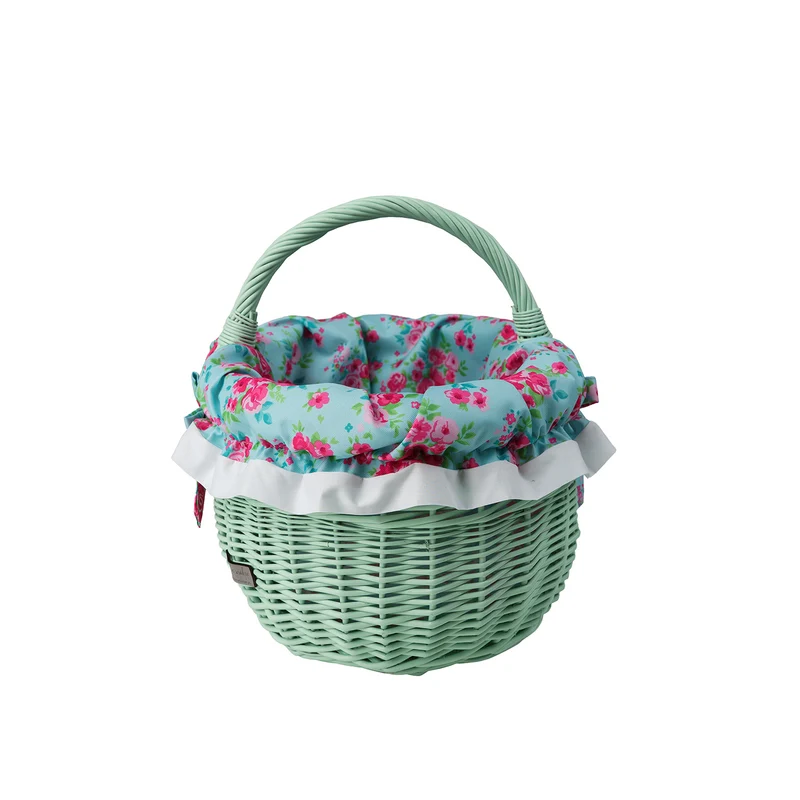 Werburga shopping basket with a wicker handle and green trim TheWickerStories