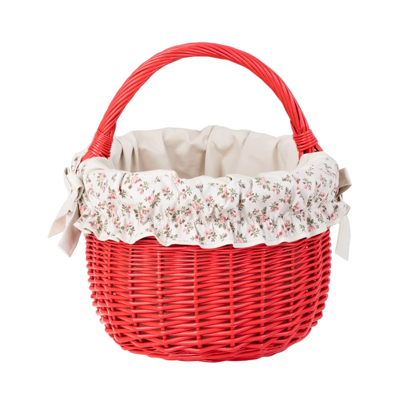 Werburga shopping basket with a wicker handle and white trim TheWickerStories