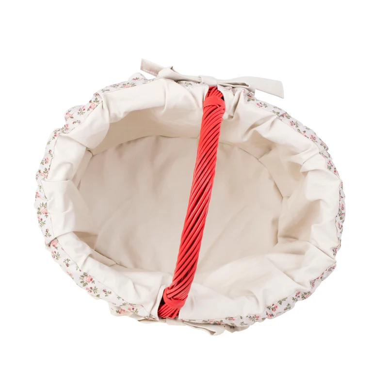 Werburga shopping basket with a wicker handle and white trim TheWickerStories