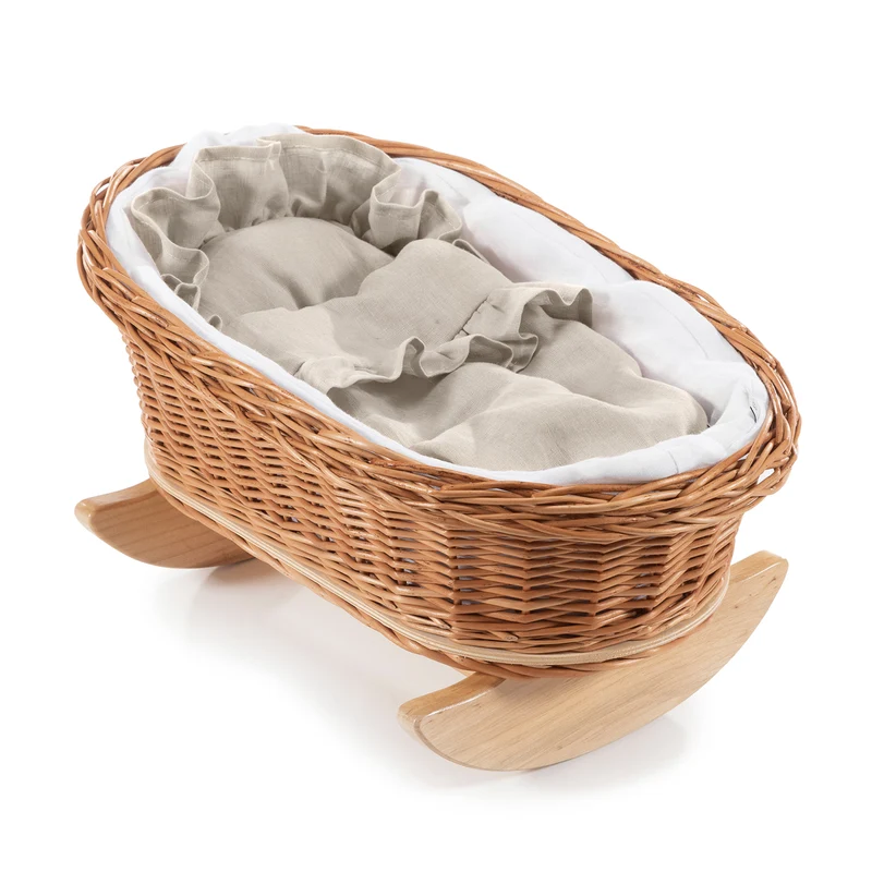 Desayerwiklinowa wicker doll cradle with white trim, pillow and quilt on beech rockers TheWickerStories
