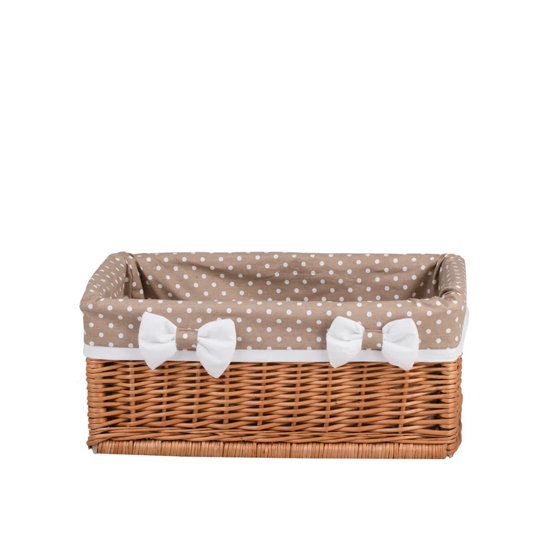 Nova wicker storage basket with beige trim and bows TheWickerStories