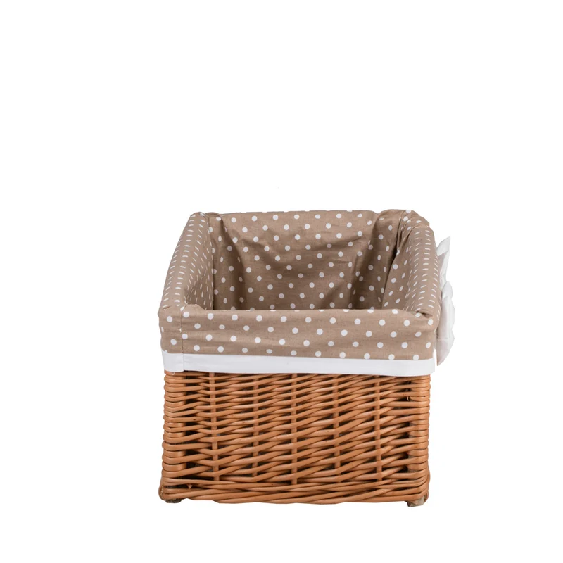 Nova wicker storage basket with beige trim and bows TheWickerStories