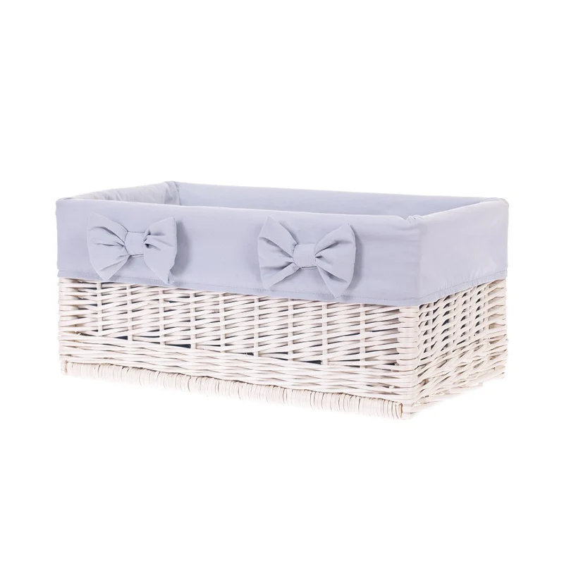Nova wicker storage basket for shelf with gray trim and bows TheWickerStories