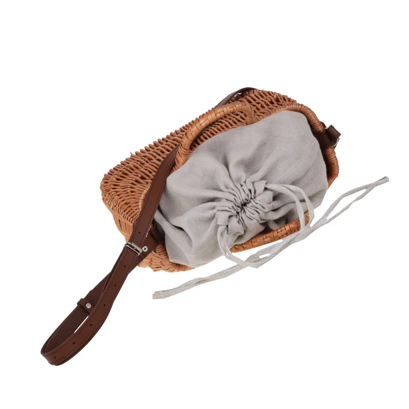 Raja wicker handbag with grey lining and strap TheWickerStories