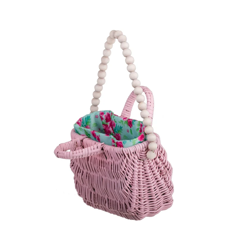 Werlissa wicker basket-handbag for women with mint trim, handle, and decorative beads TheWickerStories