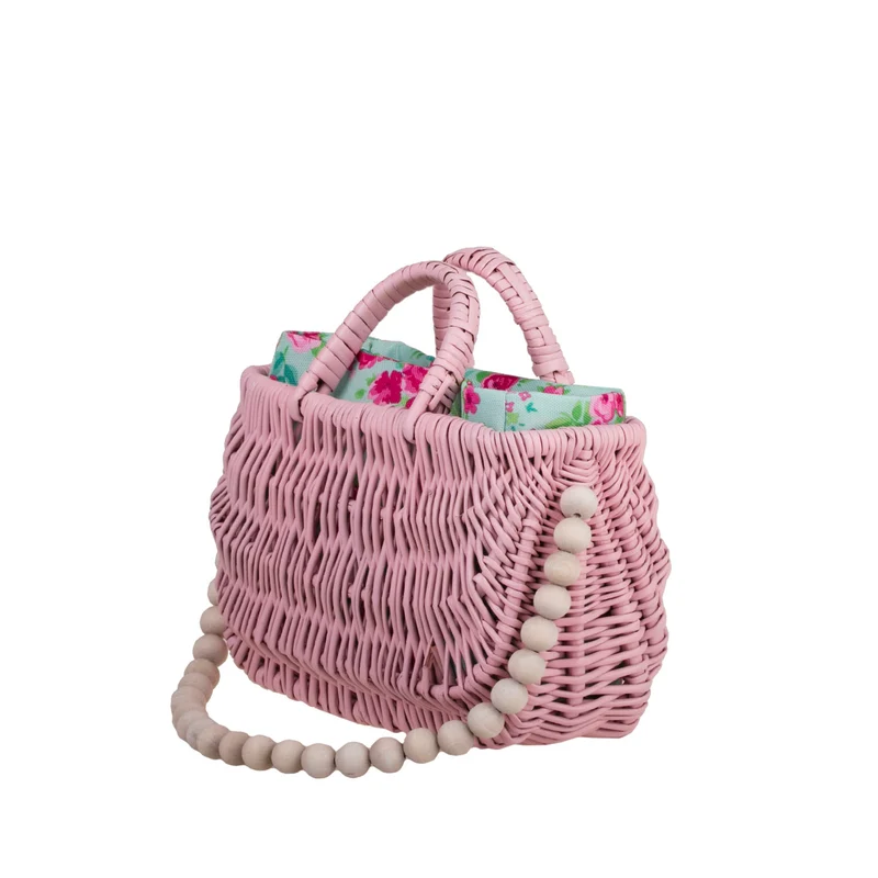 Werlissa wicker basket-handbag for women with mint trim, handle, and decorative beads TheWickerStories