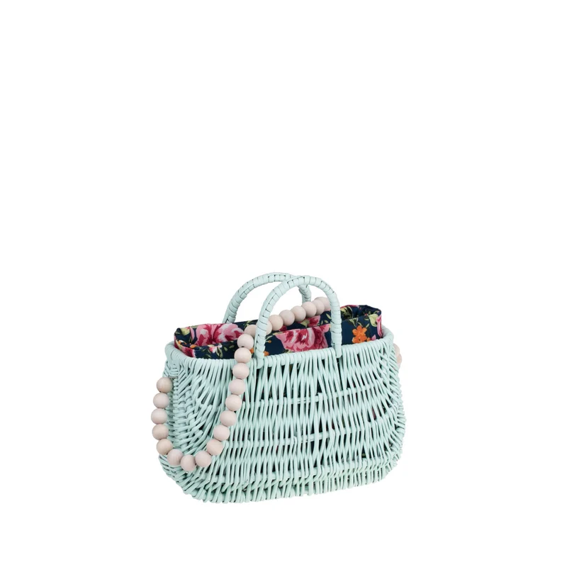 Werlissa wicker beach bag with navy trim, featuring handles and a strap made of wooden beads TheWickerStories