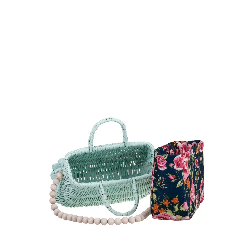 Werlissa wicker beach bag with navy trim, featuring handles and a strap made of wooden beads TheWickerStories