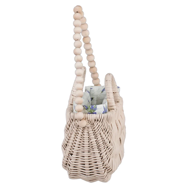 Raja wicker handbag with white lining and handle TheWickerStories