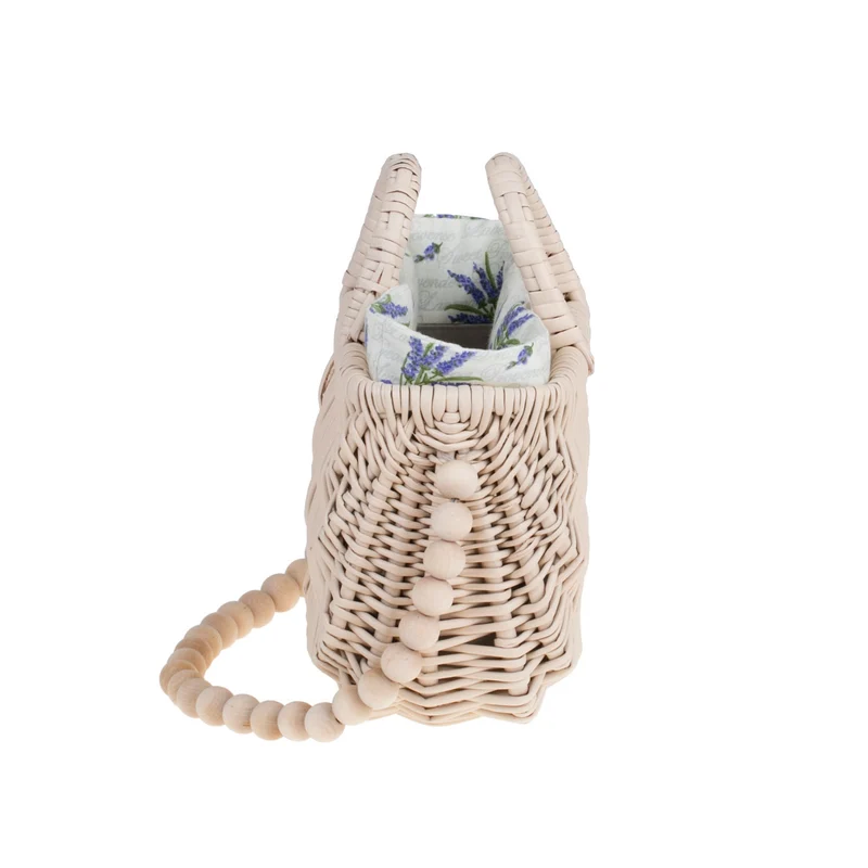 Raja wicker handbag with white lining and handle TheWickerStories