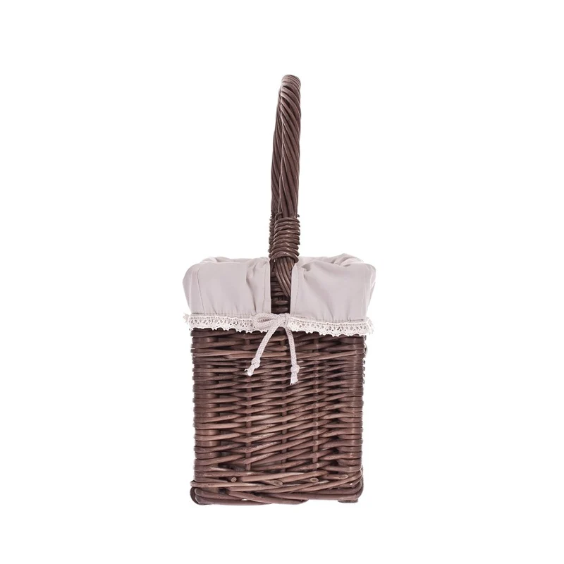 Gavis wicker magazine basket with beige trim and handle TheWickerStories