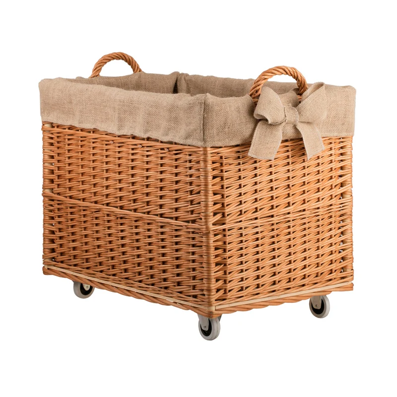 Salux wicker firewood basket with jute lining and wheels TheWickerStories