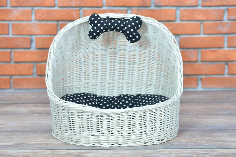 Elsa wicker pet bed basket with black cushion and bow TheWickerStories