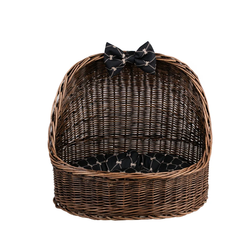 Elsa wicker pet bed basket with black cushion and bow TheWickerStories